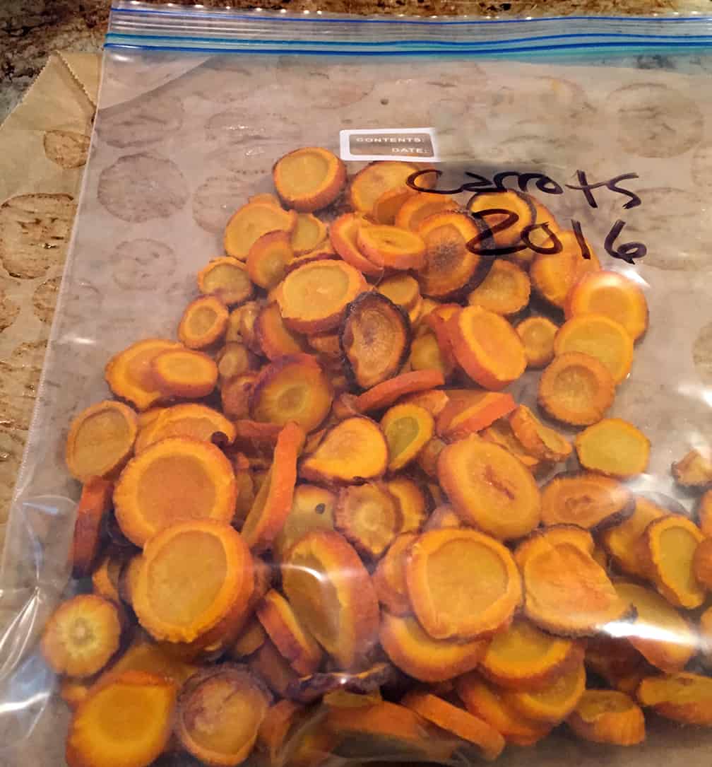 Label and put them in the freezer. The wonderful thing about preserving carrots this way is you can remove a few or many from the bag to toss into pasta sauces, soup, or any other dish throughout the winter.