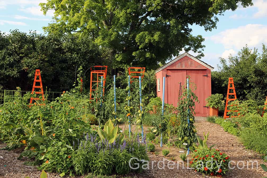 Tower Hill's vegetable garden is made even more pleasing by the shed and colorful plant supports. But that's only the icing on the cake.